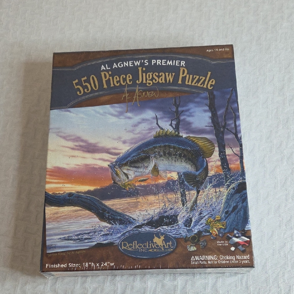 Al AGNEW'S PREMIER 550 PIECE JIGSAW PUZZLE. Strike King FISH BEING CAUGHT.